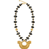 A gold and black beaded necklace featuring a large gold crescent moon pendant with dragon heads on either side, displayed on a clean white background.
