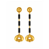 A pair of gold and black drop earrings with textured circular gold tops, black cylindrical beads, and oval gold pendants, shown on a plain white background.