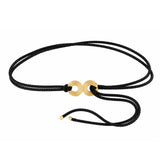 A double-strand black cord bracelet with two polished gold circular disc charms in the center, displayed on a clean white background.