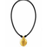 A minimalist gold pendant necklace on a black multi-strand cord, shown against a plain white background.