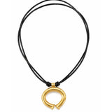 A black multi-strand cord necklace with a polished gold-toned split ring pendant, displayed on a clean white background.