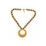A gold-tone beaded necklace with alternating polished round beads and smaller faceted beads, featuring a large open circular pendant at the center, shown on a plain white background.